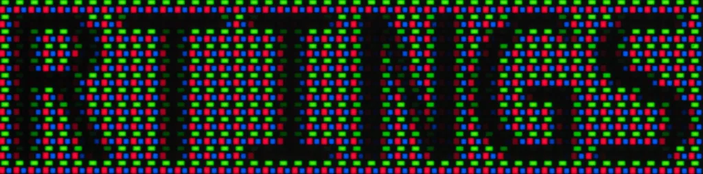 Gigabyte AORUS FO27Q3 - triangular RGB text rendering Close-up of text on the Gigabyte AORUS FO27Q3 with ClearType on